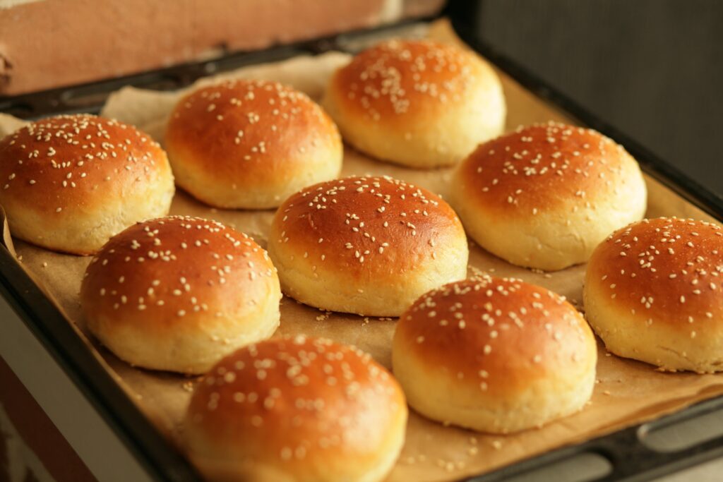 Homemade hamburger buns are soft, oven-baked, and delicious. They can be made a day ahead of time, or even the night before.