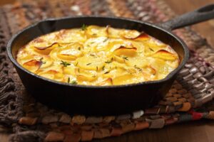 This easy recipe for homemade scalloped potatoes is perfect for a holiday side dish or anytime you're craving something creamy and delicious.